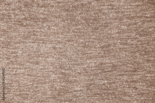 Closeup of beautiful woven cotton mixed with polyester fabric in warm brown tone with rough surface and texture for background and decoration. Cool banner on page and cover