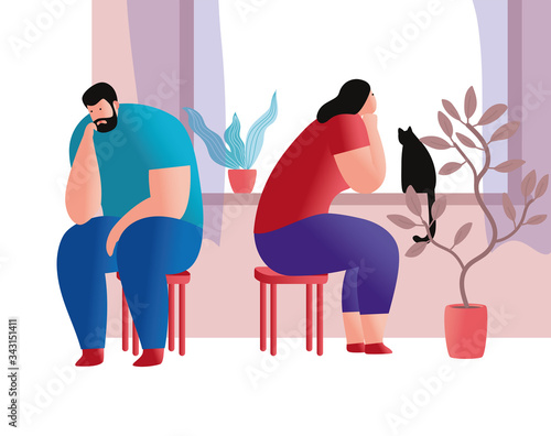 A bored man and woman are staying at home during quarantine.
