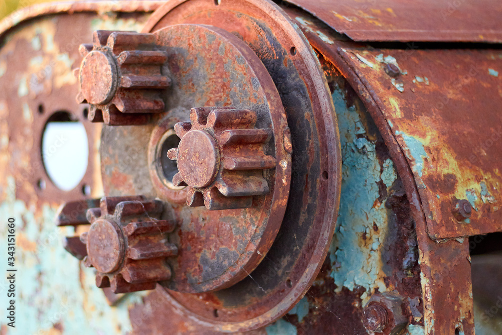 Detail of old rusty cogs for heavy industry