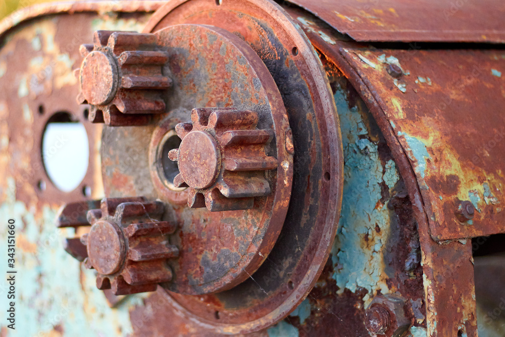 Detail of old rusty cogs for heavy industry Detail of old rusty cogs for heavy industry