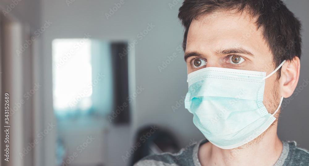Flue and corona safety concept. Portrait of man wearing face mask to protect himself. Flue and corona safety concept. Portrait of man wearing face mask to protect himself.