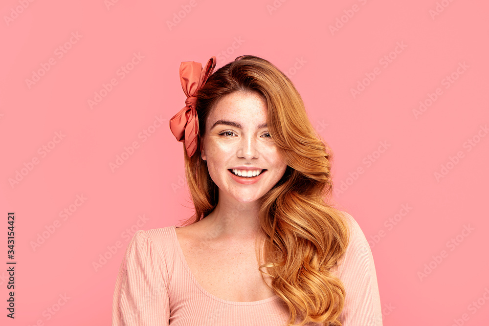 Portrait of smiling redhead woman with freckles. Portrait of smiling redhead woman with freckles.