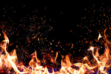 Flames of fire on a dark background. Copy space, place for text.