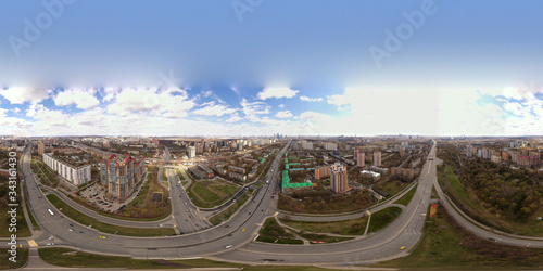 panoramic view with skyscrapers and highways of a big city filmed from a drone