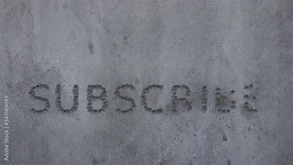 Bullet hits in a concrete wall, spelling out the word Bullet hits in a concrete wall, spelling out the word
