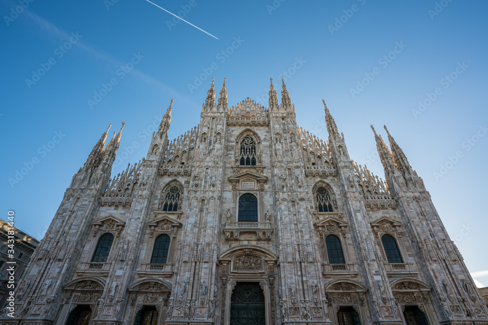 Close up of Duomo di Milano church in the early morning during sunrise, Milan Italy