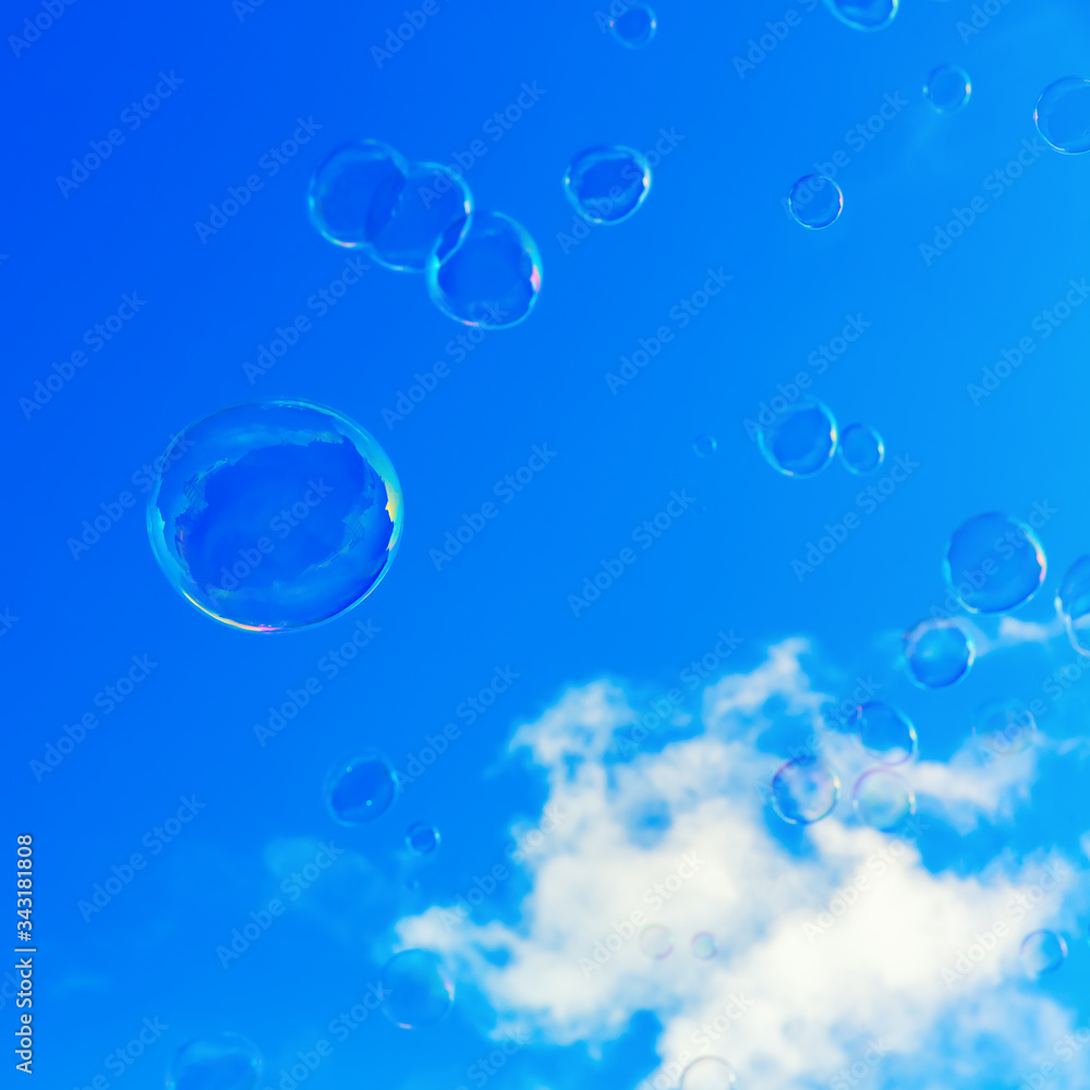 soap bubbles flying in the sky