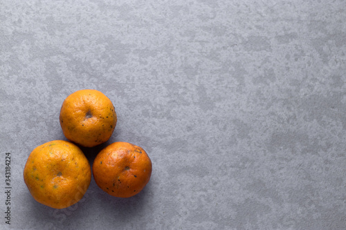 Fresh orange slices with nice textured background.

