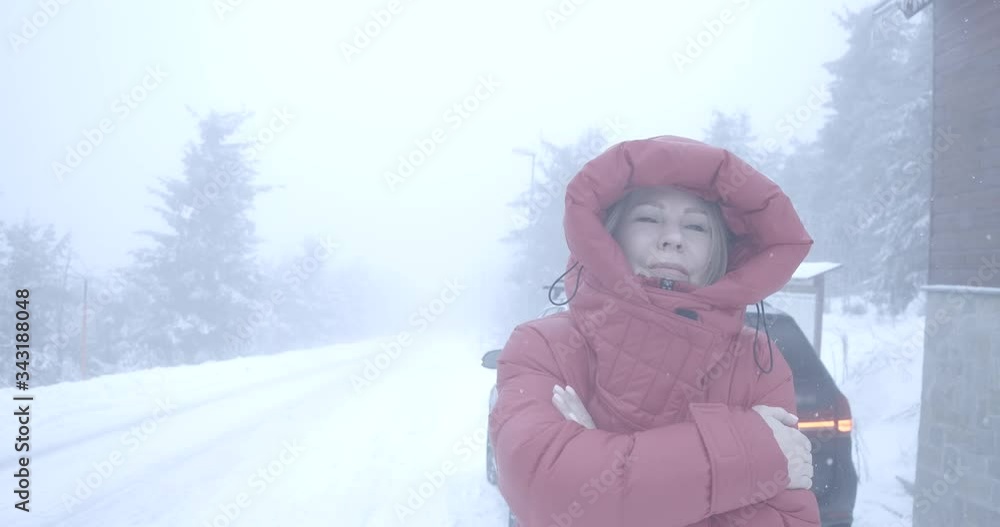 Freezed Caucasian woman standing in front of broken car on snowy winter road. Female driver having problem with automobile on journey and hitchhiking. Accident, tourism, lifestyle. Cinema 4k ProRes HQ Freezed Caucasian woman standing in front of broken car on snowy winter road. Female driver having problem with automobile on journey and hitchhiking. Accident, tourism, lifestyle. Cinema 4k ProRes HQ
