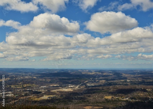 Blue Sky Cloud Shadows. Rolling mountain ranges blending into the horizon. Early spring 2020, on White Rock Bennington VT.
