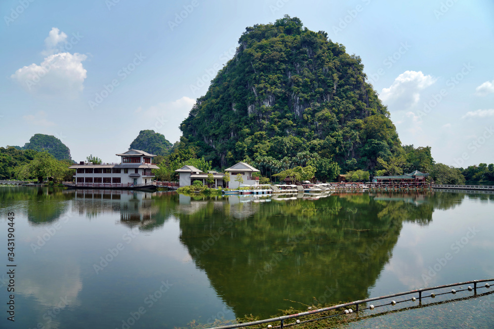 Seven Stars Cave Scenic Park in Zhaoqing City of Guangdong Province centers around the Star Lake and the Seven Peaks Seven Stars Cave Scenic Park in Zhaoqing City of Guangdong Province centers around the Star Lake and the Seven Peaks