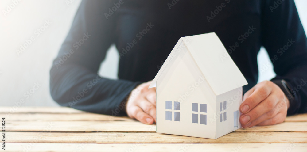 Paper house. Property protection concept, home insurance Paper house. Property protection concept, home insurance