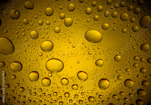 water drops on yellow background
