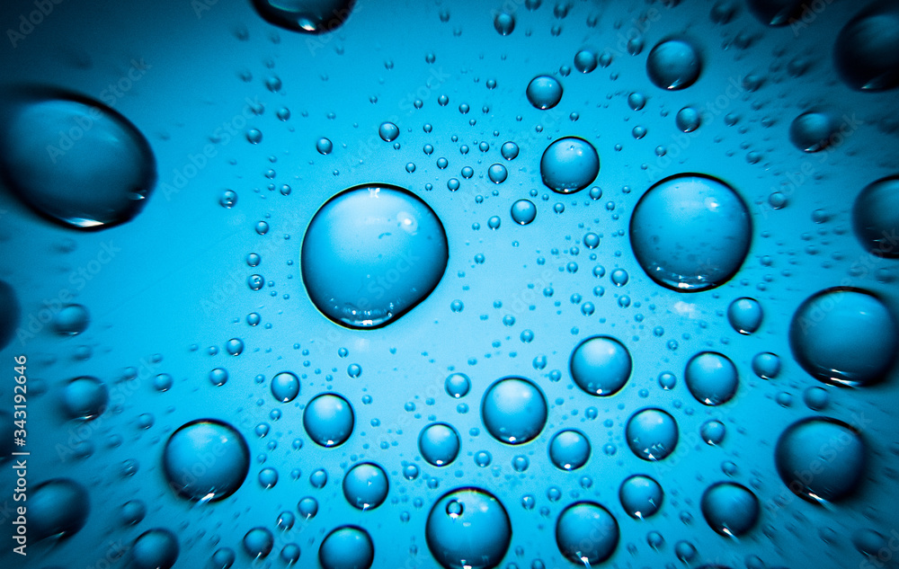 water drops on blue background water drops on blue background