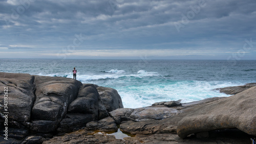 Woman looking to the sea 