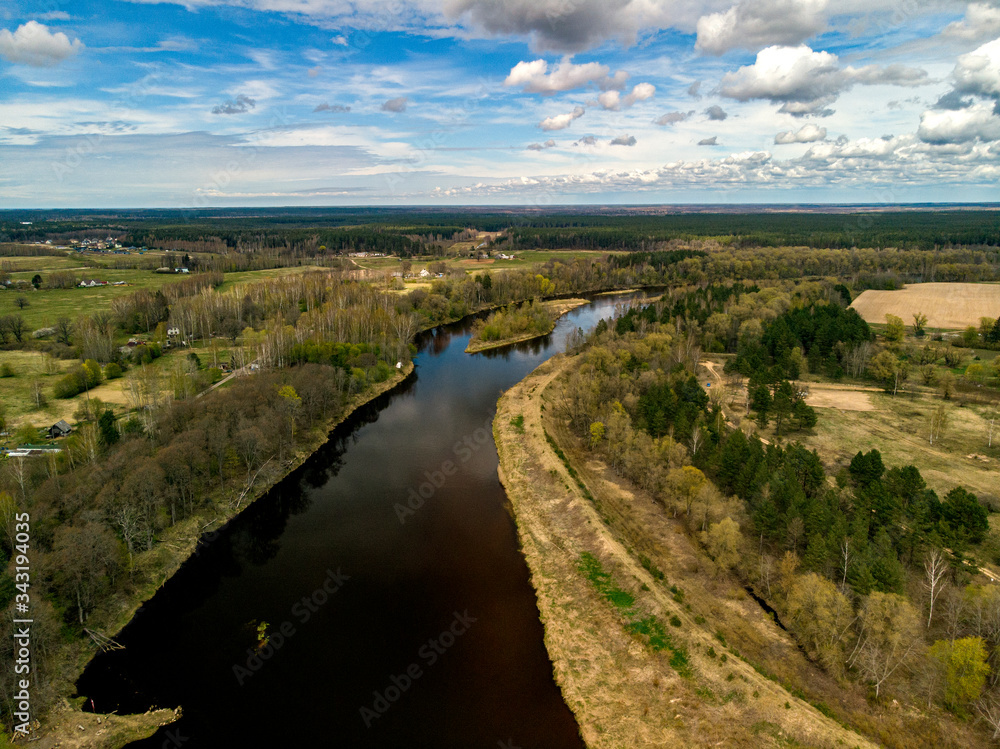 Gauja river during a calm spring day aerial view 