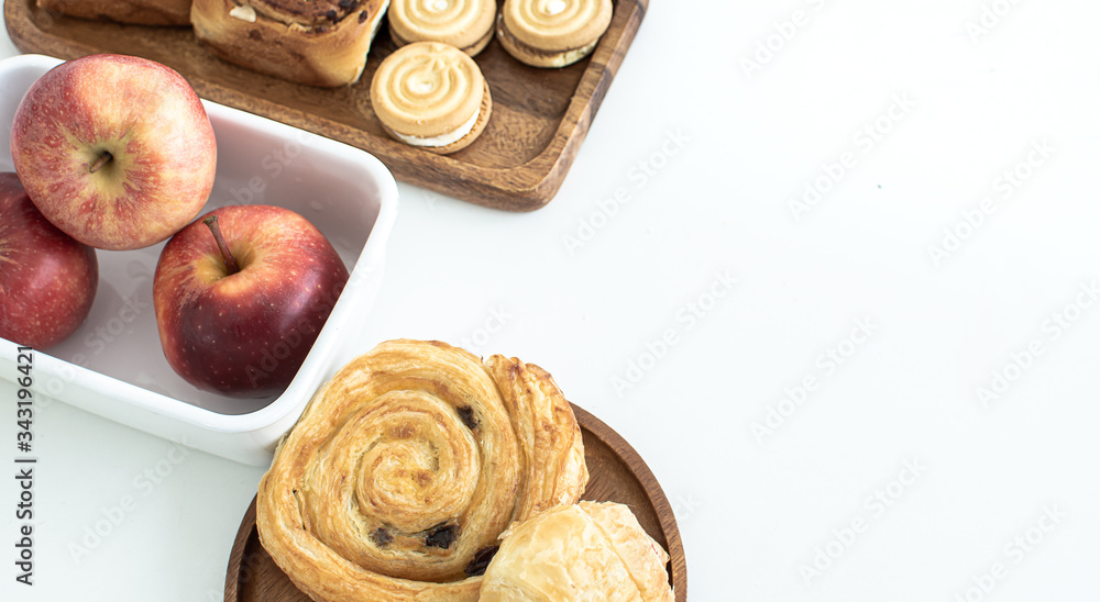 Bakery and apples on white background Bakery and apples on white background