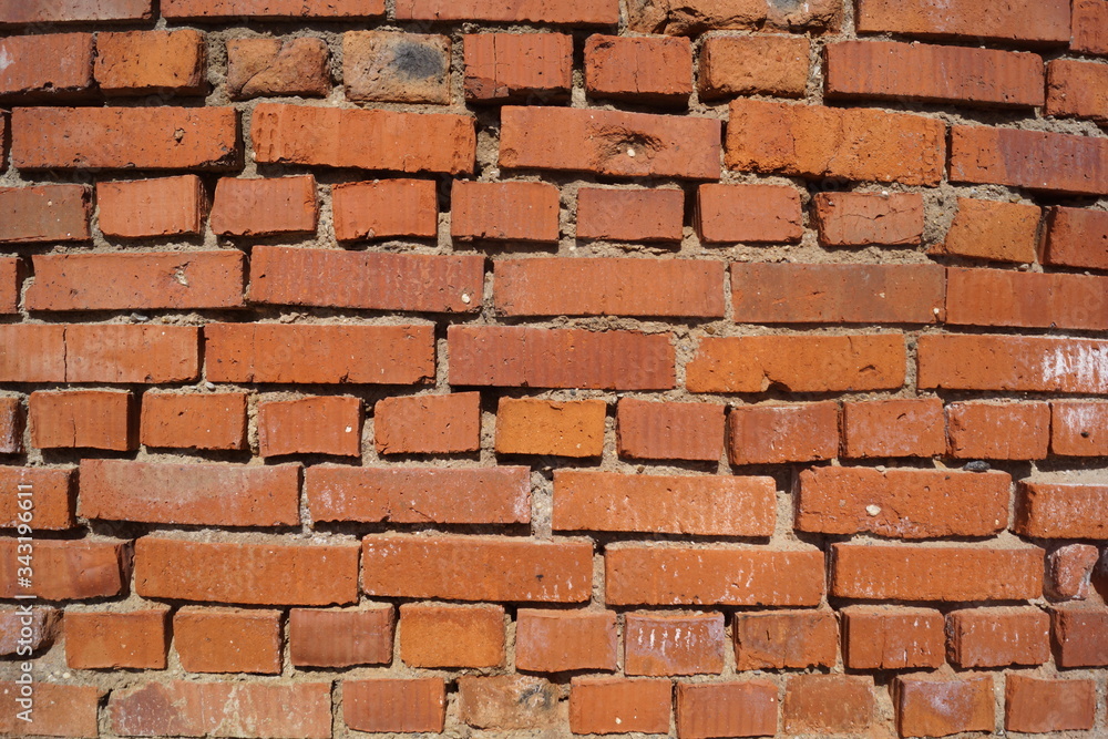Fototapeta premium A brick wall close up wallundefined orange