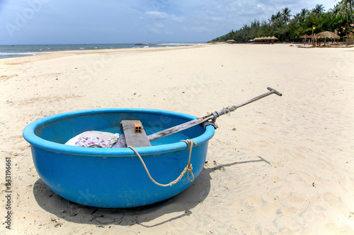 fishing boat on the beach, mui ne, Vietnam. photo