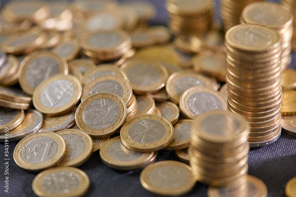 Stock Photo - Euro coins. Euro money. Euro currency.Coins stacked on each other in different positions. Money concept Stock Photo - Euro coins. Euro money. Euro currency.Coins stacked on each other in different positions. Money concept