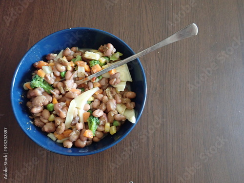  bowl of beans vegetable salad with cheese photo