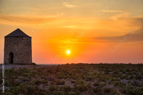 Old windmill at Agios Ioannis beach, Lefkada, Greece