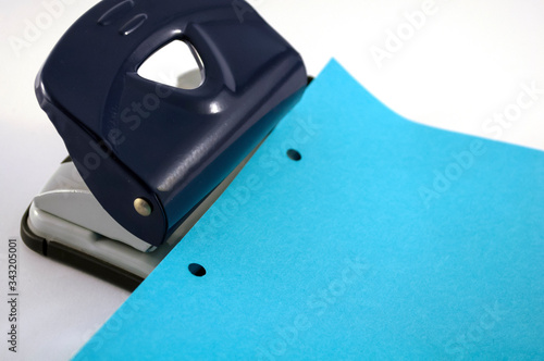 office, punch, blue paper with punch holes