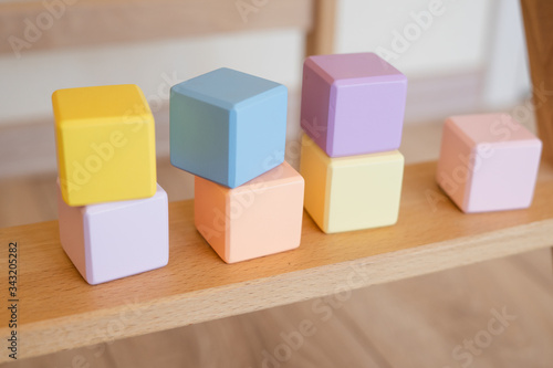 Colored cubes made of natural wood.