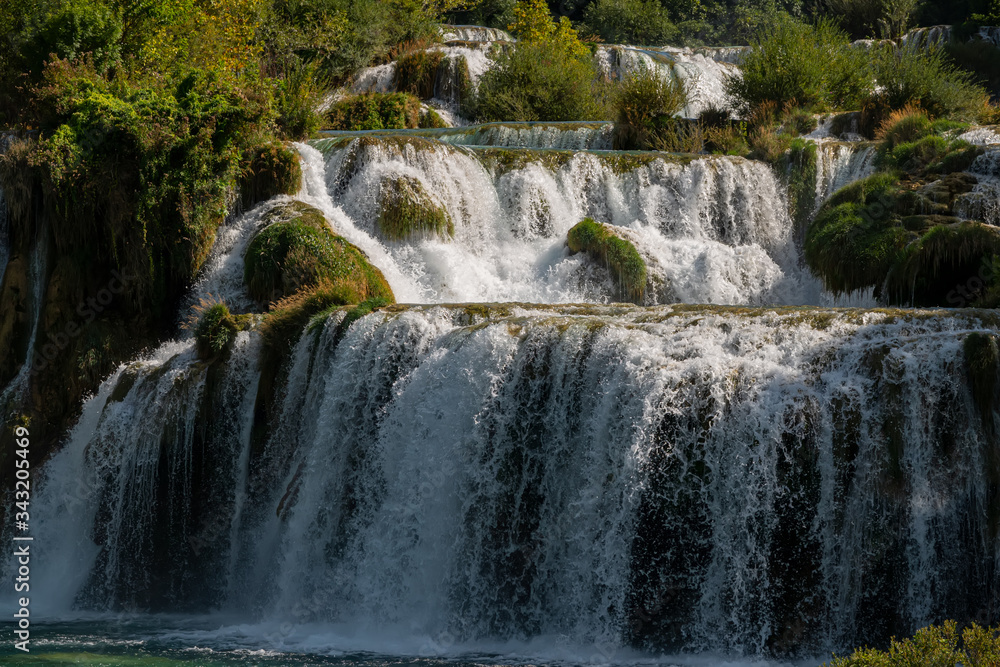Amazing view of the natural Krka waterfalls. Sunny day, view of the Krka National Park located by Roski Slap in Croatia.