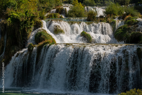 Amazing view of the natural Krka waterfalls. Sunny day  view of the Krka National Park located by Roski Slap in Croatia.