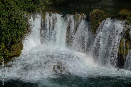 Fototapeta Naklejka Na Ścianę i Meble -  Amazing view of the natural Krka waterfalls. Sunny day, view of the Krka National Park located by Roski Slap in Croatia.