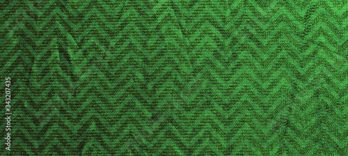 Wrinkled rich green silver fabric. Texture background for design