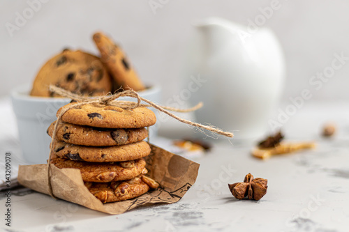 Chocolate Chip Cookies. Homemade baking. Round shape, not big. On a light gray background. photo