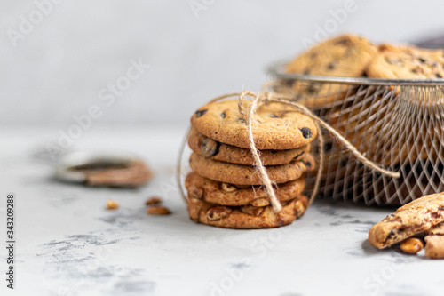 Chocolate Chip Cookies. Homemade baking. Round shape, not big. On a light gray background. photo