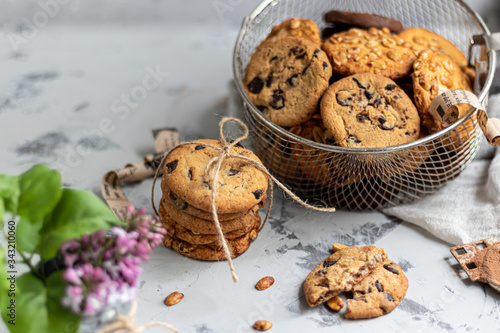 Chocolate Chip Cookies. Homemade baking. Round shape, not big. On a light gray background. photo