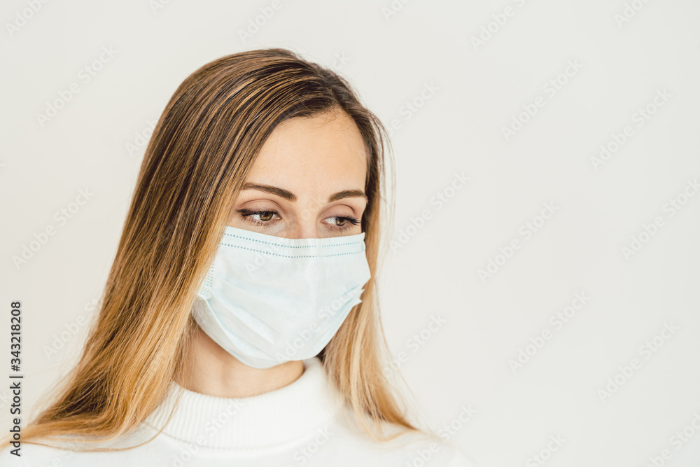 Woman contemplating what lies ahead during Coronavirus crisis Woman contemplating what lies ahead during Coronavirus crisis