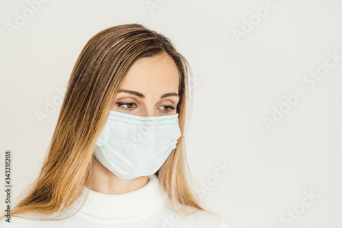 Woman contemplating what lies ahead during Coronavirus crisis