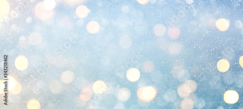 Blurred background with bokeh. Christmas and Happy New Year greeting card.