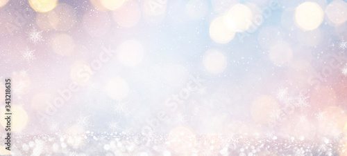 Blurred background with bokeh. Christmas and Happy New Year greeting card.