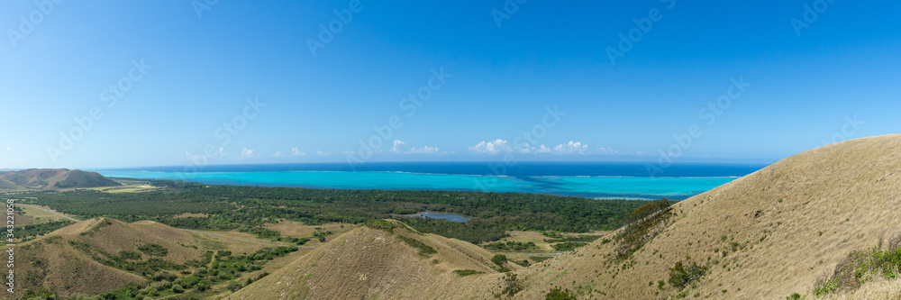 panoramic view of Gouaro Deva, Bourail, New Caledonia - shark rift in the turquoise foreground panoramic view of Gouaro Deva, Bourail, New Caledonia - shark rift in the turquoise foreground