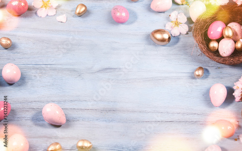 Easter background with Easter eggs and spring flowers