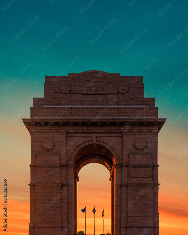 The golden hour view of the India Gate, New Delhi, India. 