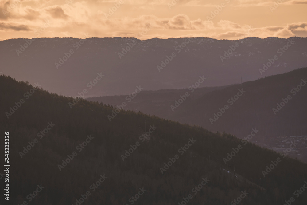 Sunset view over small mountains.