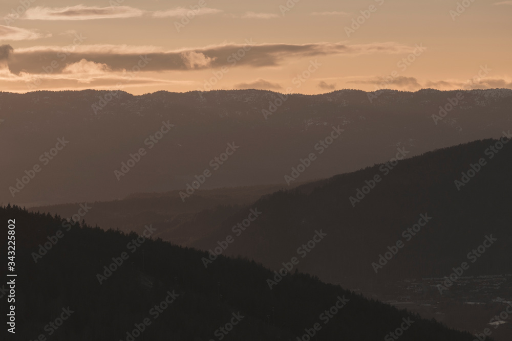 Obraz premium Evening landscape with Layers of mountain.