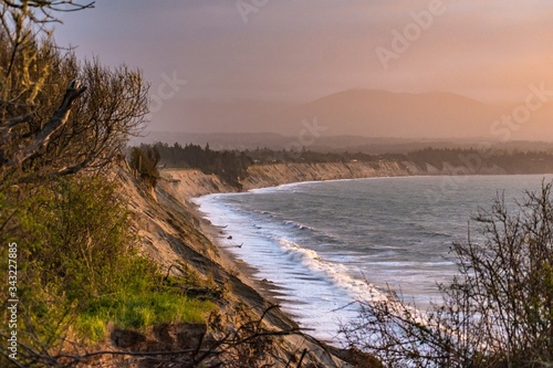 Sun lit beach in Washington State photo