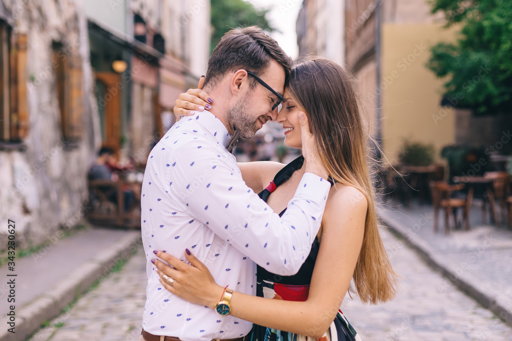 the guy and the girl closed their eyes and leaned their heads. c the guy and the girl closed their eyes and leaned their heads. c