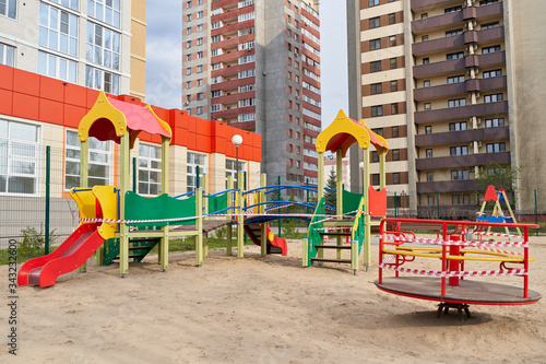 Wallpaper Mural A closed playground for children with tape during the COVID-19 pandemic, Coronavirus. Torontodigital.ca