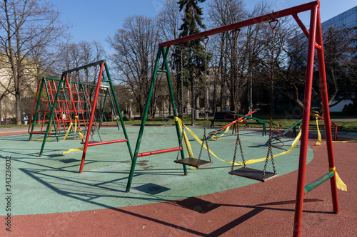 BELGRADE, SERBIA - APRIL 04, 2020: Empty children playground. Banned for use due to Coronavirus in Serbia. Prevetnion of spreading COVID19