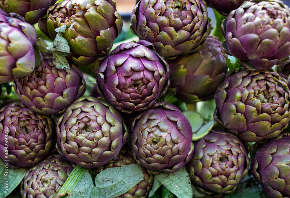 artichokes on a market stall artichokes on a market stall
