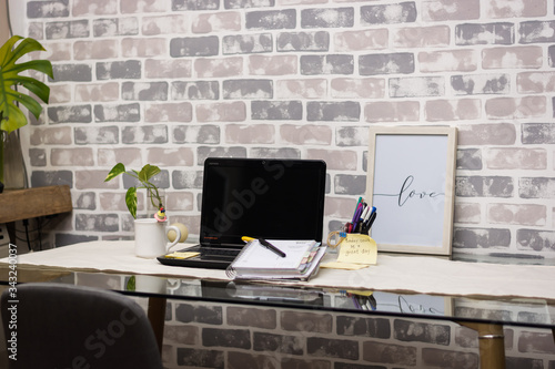 home office work with laptop planner and desk pens